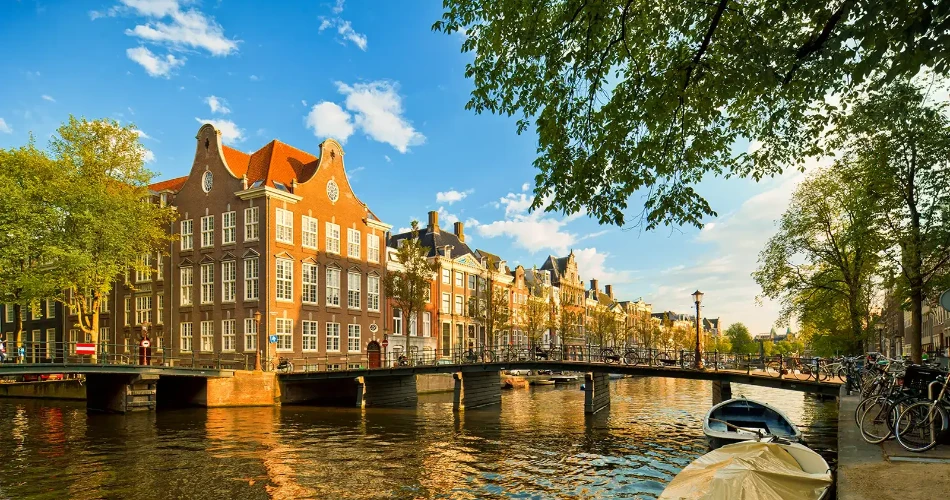 Amsterdam Travel Guide: Canals, Museums, Food & Nightlife Highlights