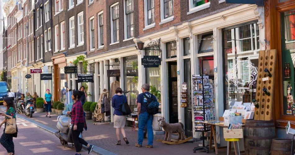 Amsterdam Travel Guide: Canals, Museums, Food & Nightlife Highlights